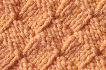 The texture of the knitted fabric is pink. A fashionable color palette is Blooming Dahlia.