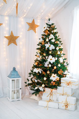 Beautiful holdiay decorated room with Christmas tree 