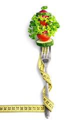 Mixed vegetables on a fork isolated. Diet concept