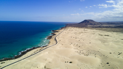 aerial view of road, desert, coast