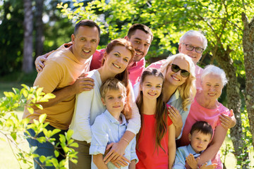 happy family portrait in summer garden