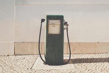 Old gasoline pump and oil dispenser