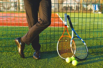 Poster Businessman on tennis court with tennis equipment © diignat