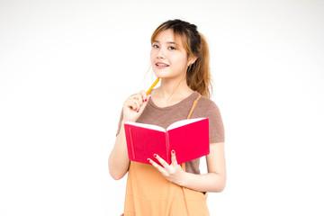 Beautiful young adult thai chinese bronze hair read red book