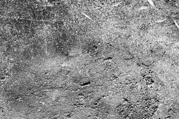 Wall fragment with scratches and cracks