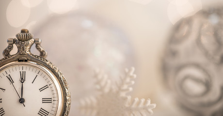 Vintage pocket watch shows new yearand copy space
