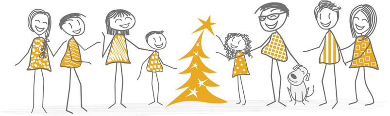 Un enfant décore le sapin de Noël aidé de sa famille et d'amis