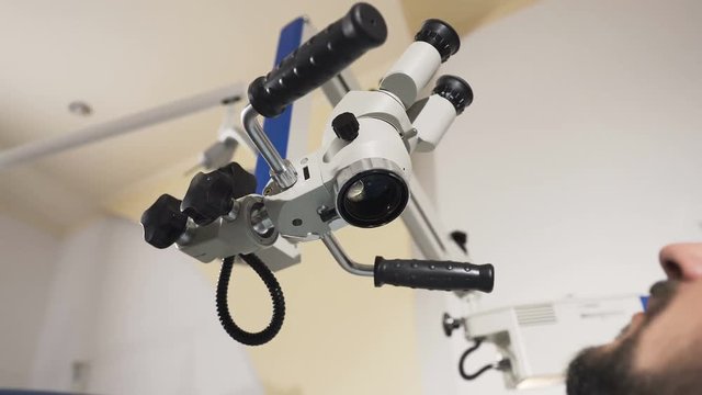 Close up. Dental microscope. Dental Instruments. Medicine, Dentistry and Healthcare Concept. Dental equipment.