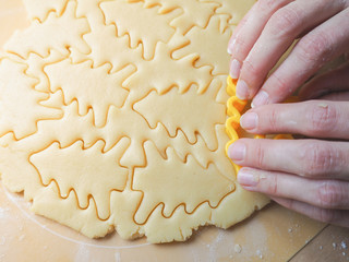Festive Christmas cookies. Background of shortbread in the shape of Christmas trees.
