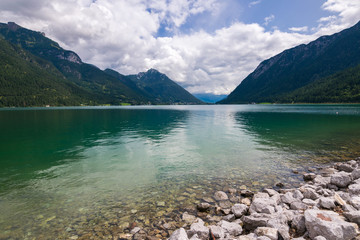 Hiking on a clouded day at Lake Achen (Achensee), Achen Valley,  Karwendel and Brandenberg Alps, Tyrol, Austria, Europe