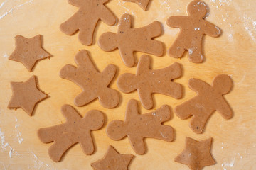 Cooking and decorating christmas gingerbread men. Background.