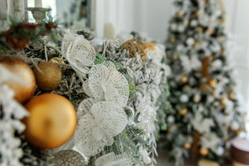 Christmas tree with white and gold decorations