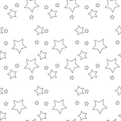 Seamless vector pattern with colored stars of various sizes on white background.
