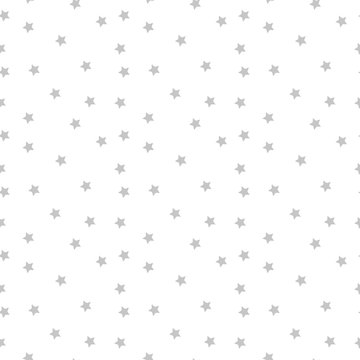 Seamless vector pattern with colored stars on white background.