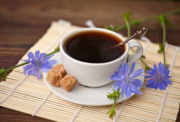 instant chicory in beautiful cup on wooden background