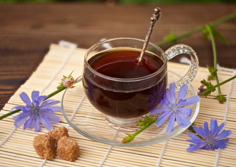 instant chicory in beautiful cup on wooden background