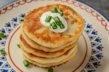 Plate with Hanukkah potato pancakes, closeup
