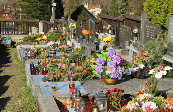 various decorated graves on the cemetery in Prazmo, Czech Republic