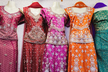 Traditional Indian women's clothing for sale at the street market in Chinatown district, Bangkok,...