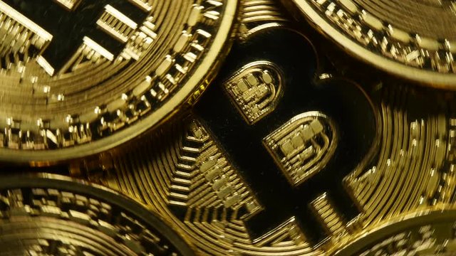 Gold Bitcoin Coins Rotating