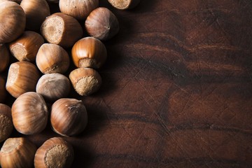 hazelnuts on wooden background