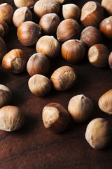 hazelnuts on wooden background