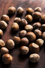 hazelnuts on wooden background