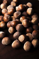 hazelnuts on wooden background