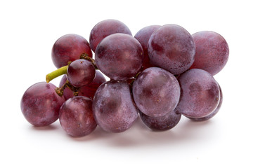 Ripe red grape isolated on white.