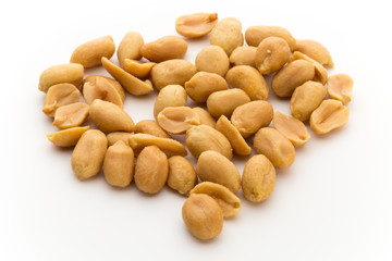 Peeled peanuts on the isolated background.
