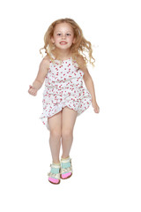 Little girl is jumping.