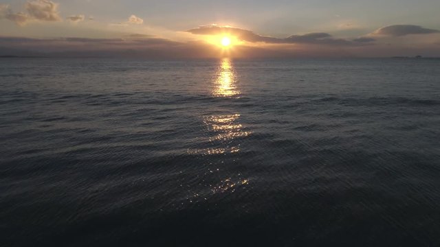 Idyllic Drone Footage Of Sunset Over Beach