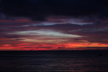 Naklejka na ściany i meble Sunset on horizon in Boracay