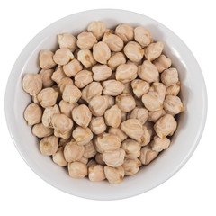 Top view of grains on ceramics bowl. Chickpeas