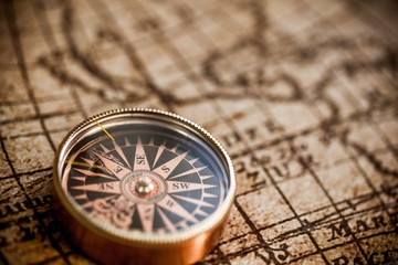 Closeup of a Compass on an Old Map