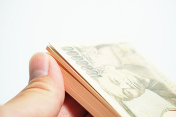 日本の紙幣（札束）の形をしたメモ帳　支払い、購入イメージ　白背景