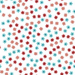 seamless pattern of colored flowers on a white background.