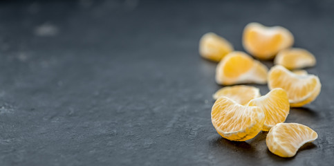 Portion of raw tangerines (close-up shot)