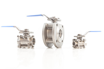 Stainless steel valves on isolated white background