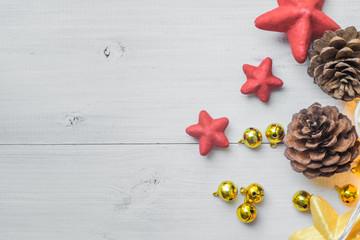 Christmas star and pine cones on vintage wooden background,celebration theme happiness party