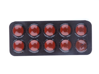 brown pills on a white background
