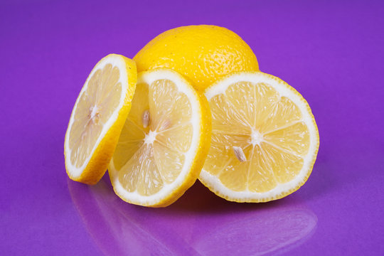 Lemon on purple background