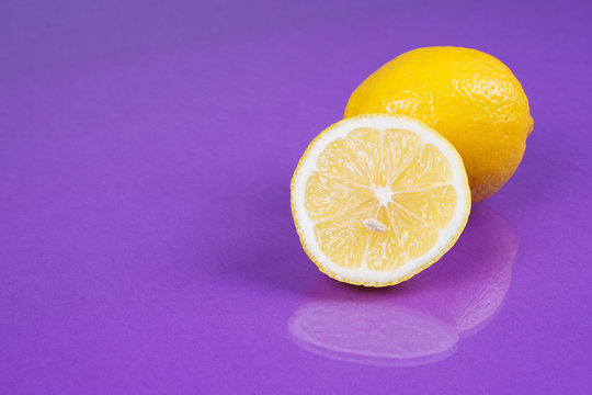 Lemon on purple background
