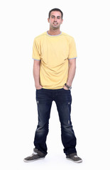 young man in a yellow t-shirt and jeans.