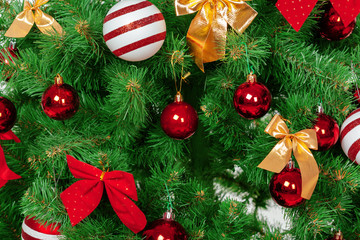 Fototapeta na wymiar Christmas tree with ornaments, close-up