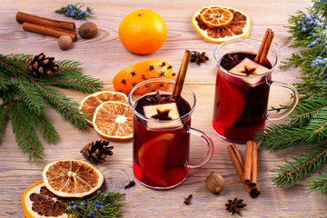 Mulled wine with spices and ingredients, horizontal