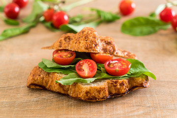 tomatoes croissant sandwich
