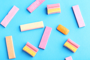 Fruit chewing gums on blue background