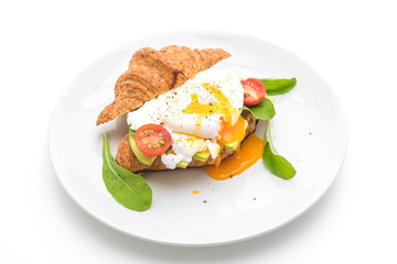 egg benedict with avocado, tomatoes and salad - healthy or vegan food style