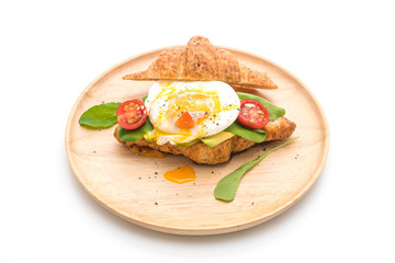 egg benedict with avocado, tomatoes and salad - healthy or vegan food style